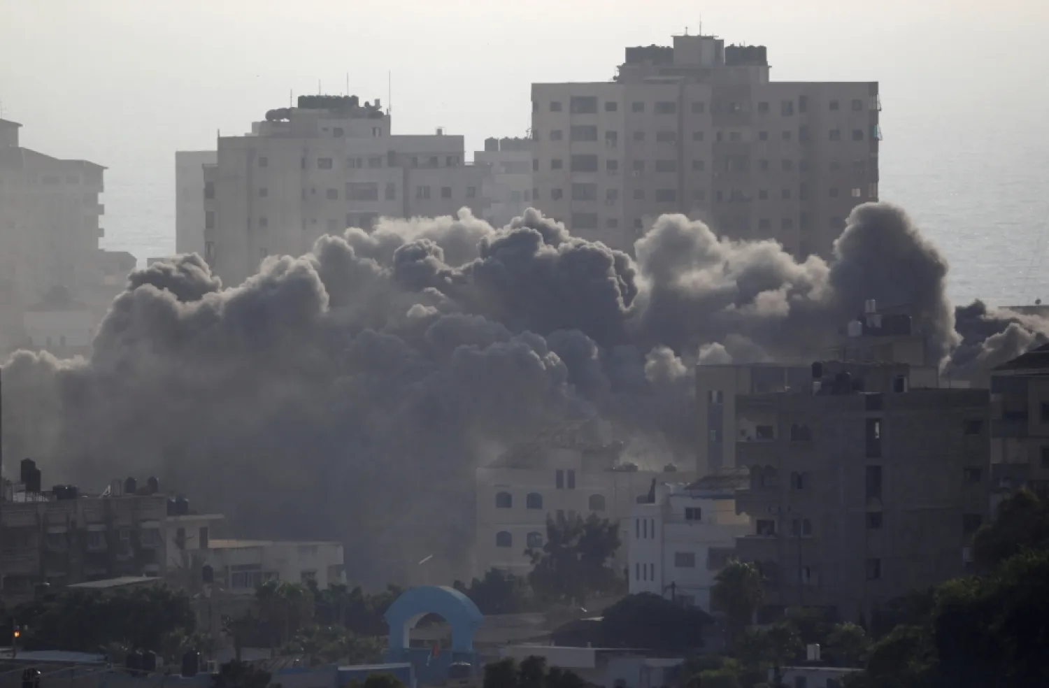 Smoke rises following an Israeli strike on a building in Gaza City July 14, 2018. Reuters