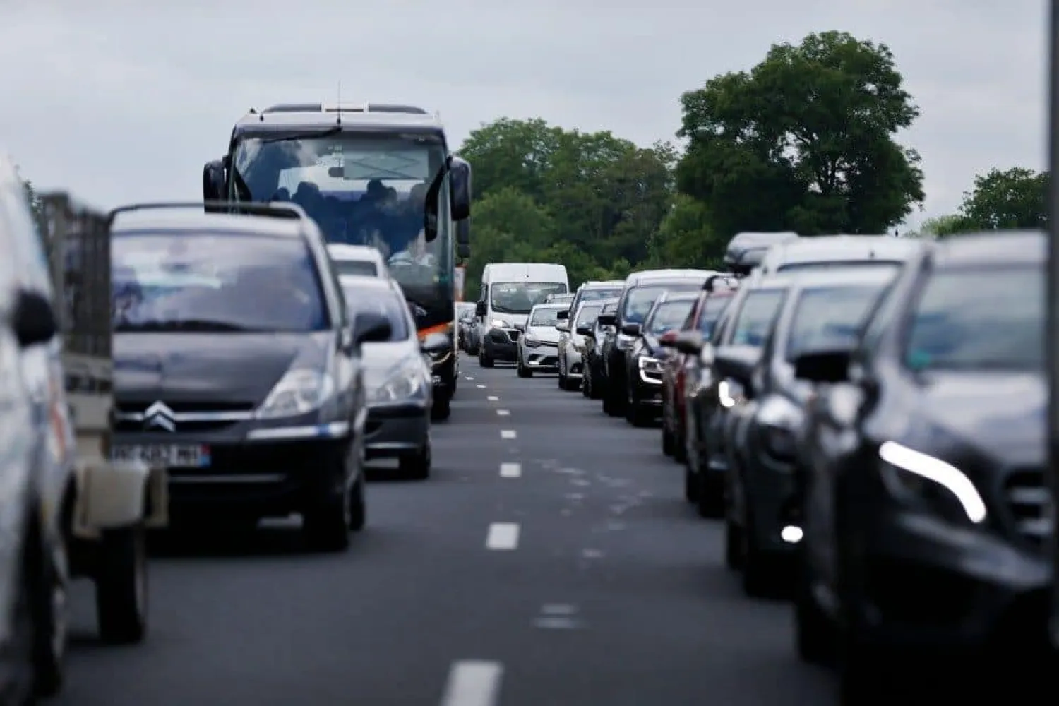 Motorists sit in a traffic jam this month near Annebault, in northwestern France, their cars collecting data on their movements all the while. (Charly Triballeau/AFP/Getty Images)