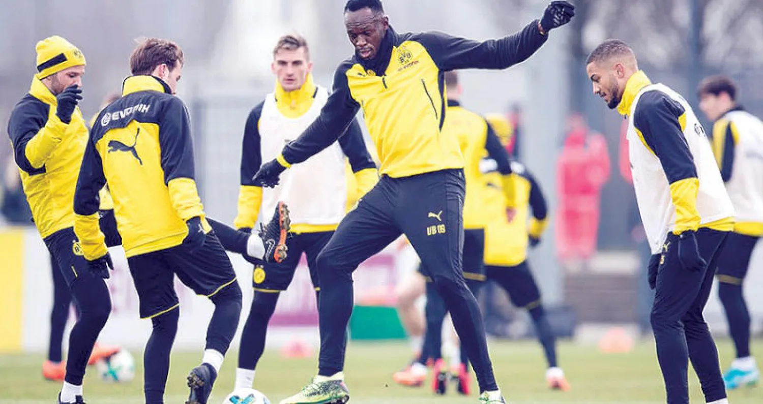 بولت تدرب مع دورتموند الألماني في مارس الماضي