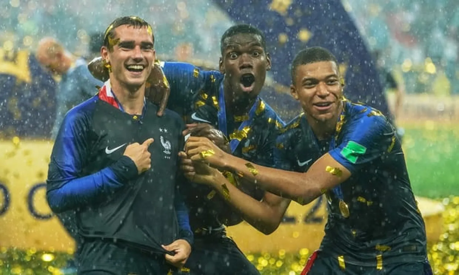  Antoine Griezmann, Paul Pogba and Kylian Mbappé show of the second star on their shirts. Photograph: Ulrik Pedersen/Action Plus/Getty Images
