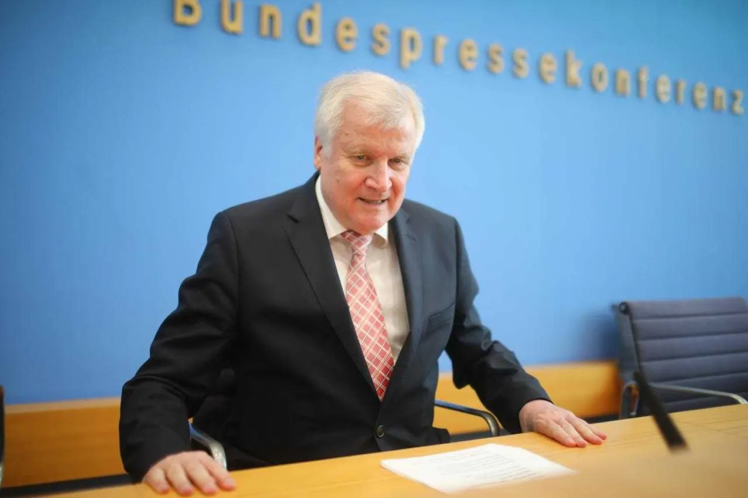 German Interior Minister Horst Seehofer leaves news conference in Berlin, Germany July 24, 2018. REUTERS/Hannibal Hanschke