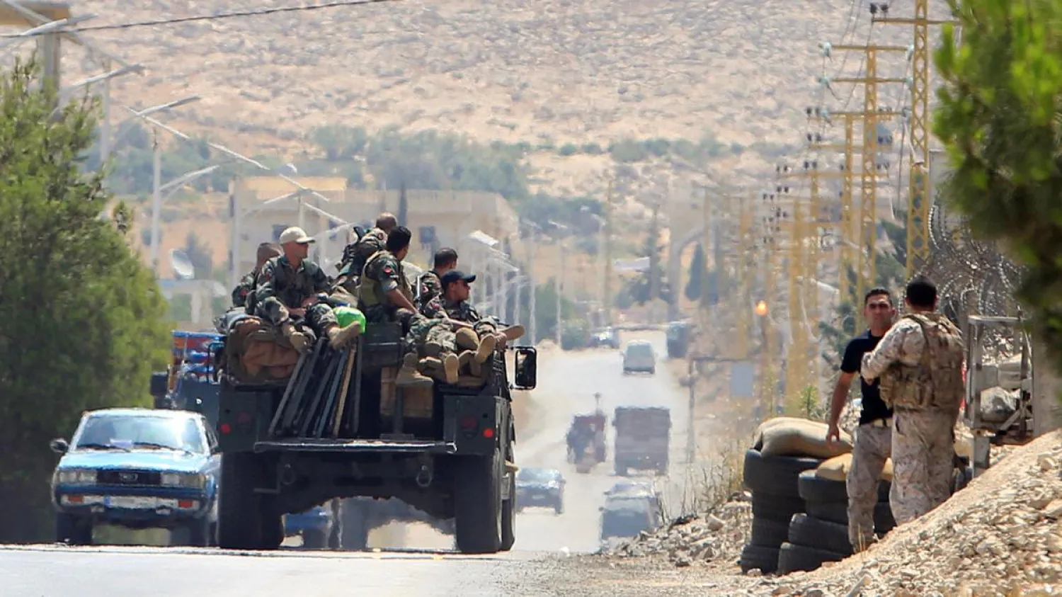 Lebanese army soldiers patrol a street in Labwe, at the entrance of the border town of Arsal, in eastern Bekaa Valley, Lebanon on July 21, 2017. Ali Hashisho / Reuters