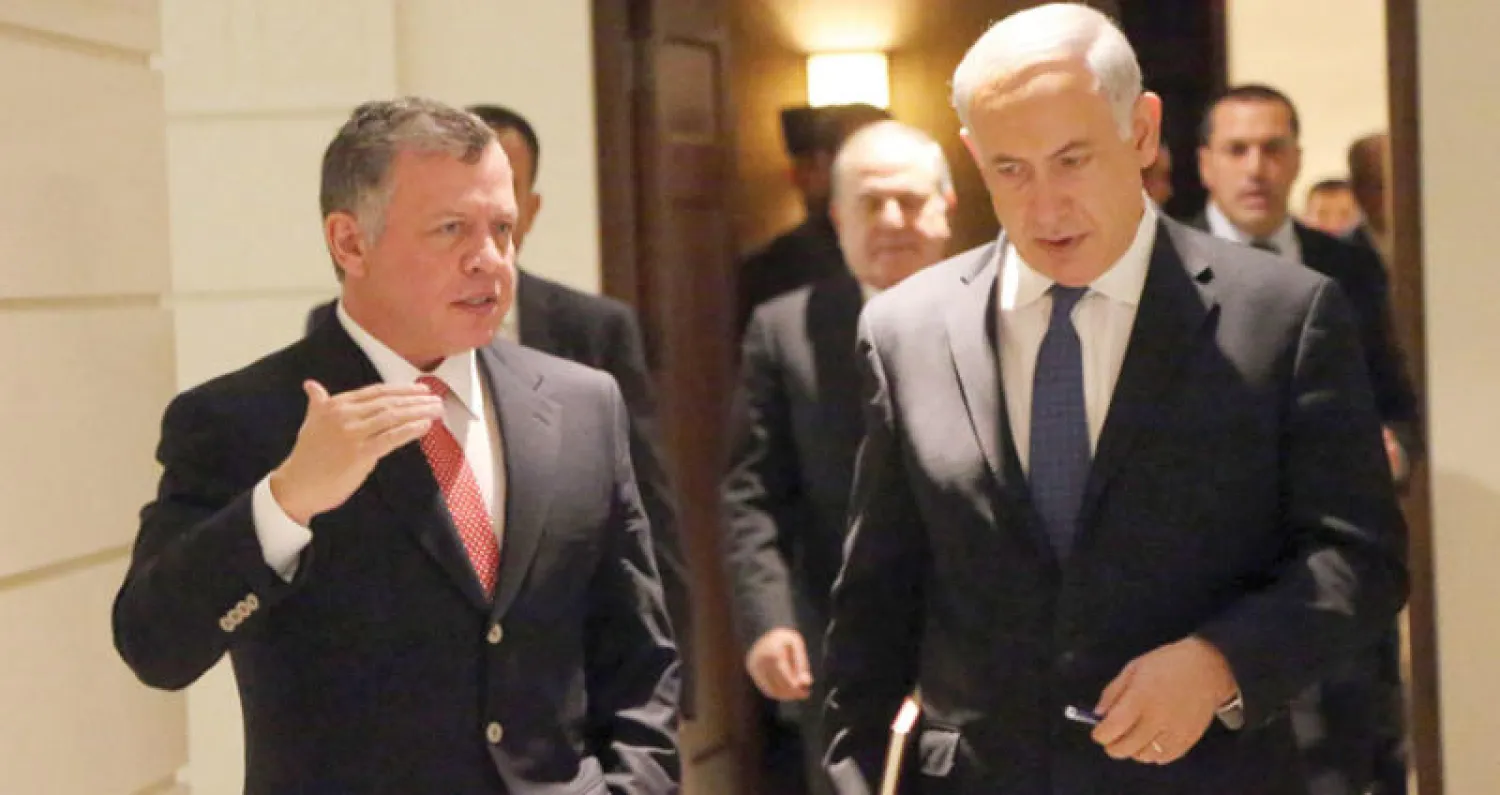 صورة وزعها الديوان الملكي الأردني للملك عبد الله الثاني أثناء لقائه رئيس الوزراء الإسرائيلي بنيامين نتنياهو في عمان (غيتي)