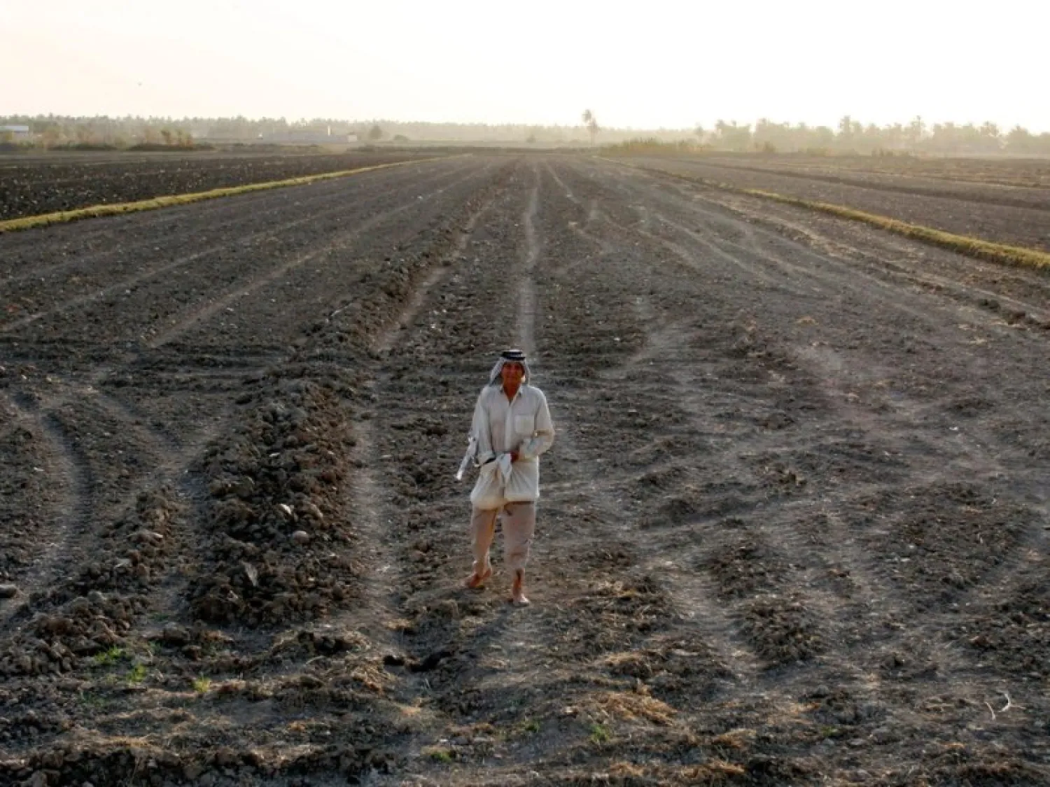 A dried-up shore of an irrigation canal near the village of Sayyed Dakhil, to the east of Nasariyah city some 300 kilometers south of Baghdad. (AFP)