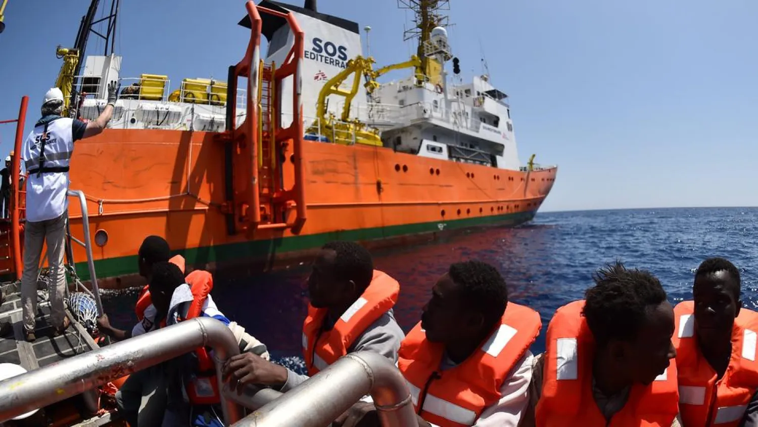 Refugees on a boat after being rescued by the Aquarius in the Mediterranean Sea. (AFP)