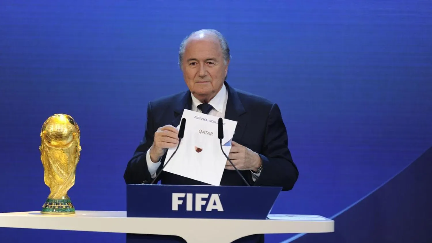 Then FIFA President Sepp Blatter declares Qatar the host of the 2022 World Cup. (AFP)