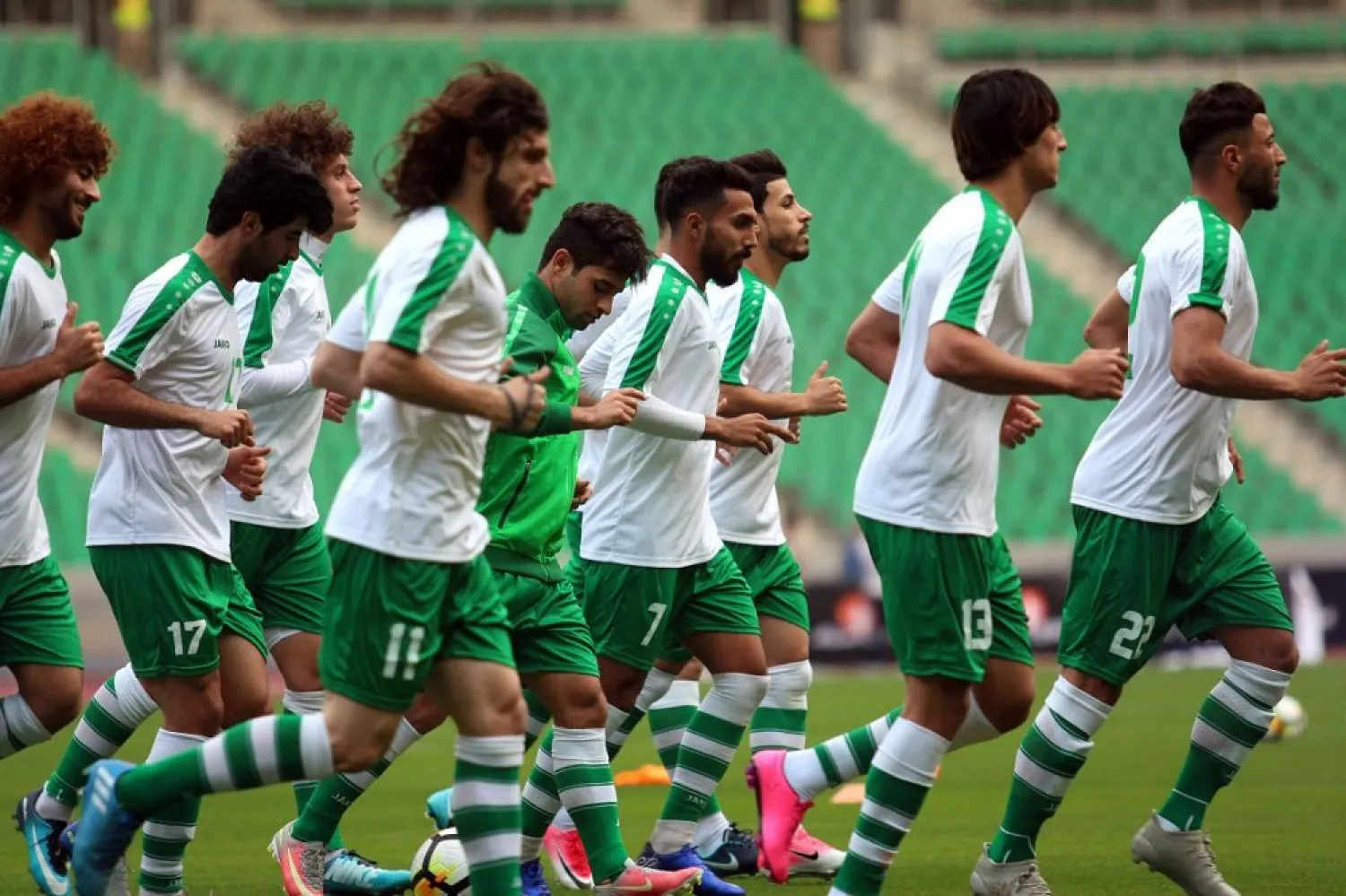 Iraqi national football team players take part in a training session in Basra city in February. (AFP)