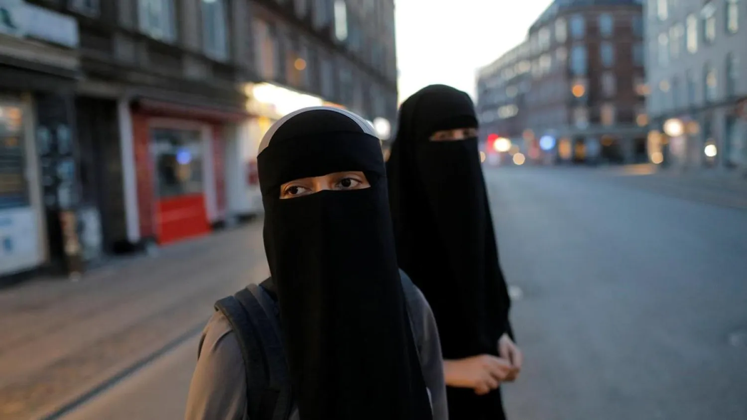 Two women wear niqabs in the Norrebro neighborhood of Copenhagen, Denmark, on July 30, 2018. (Reuters)
