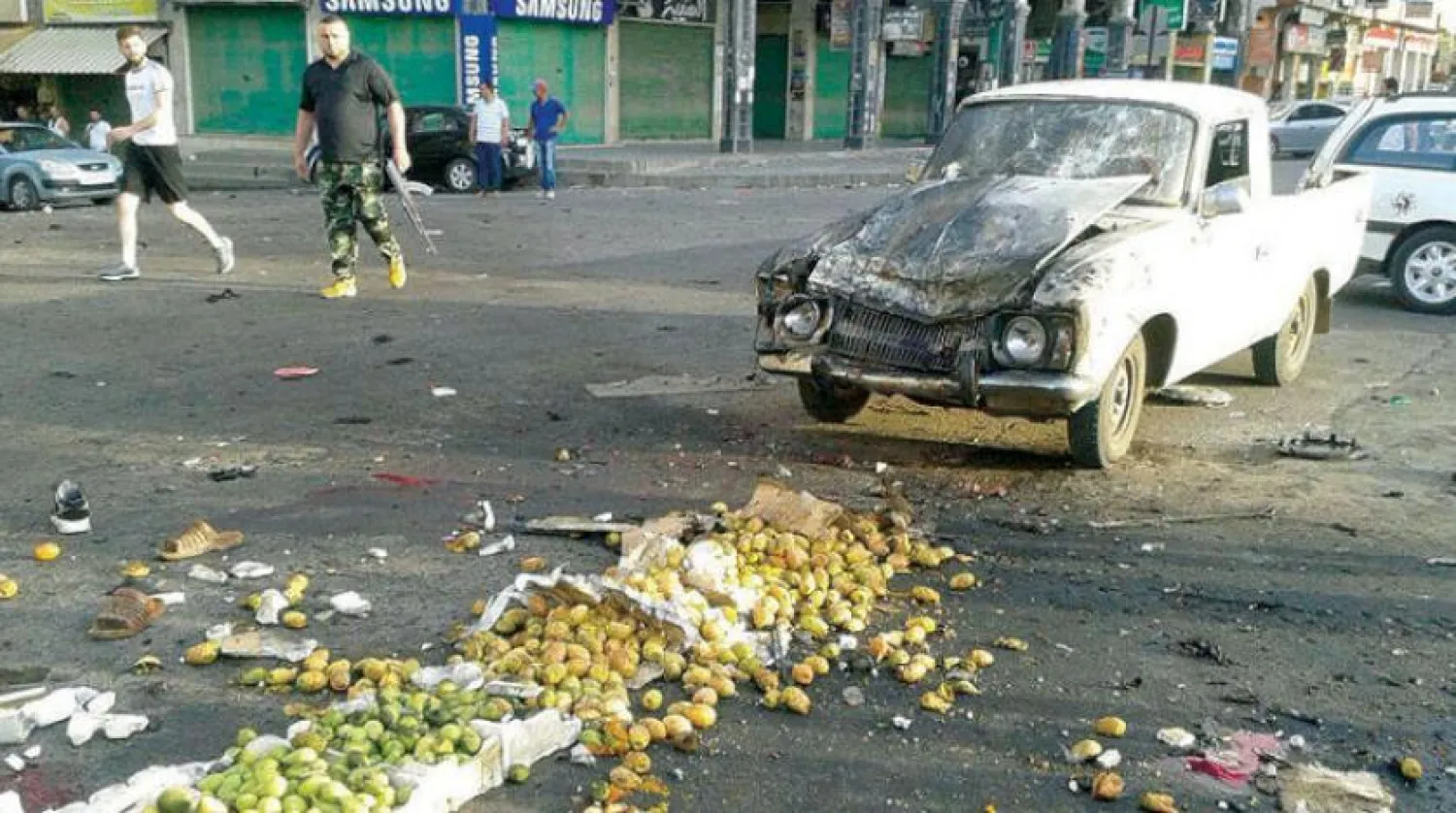A truck damaged in a suicide attack in the southern city of Sweida. Reuters