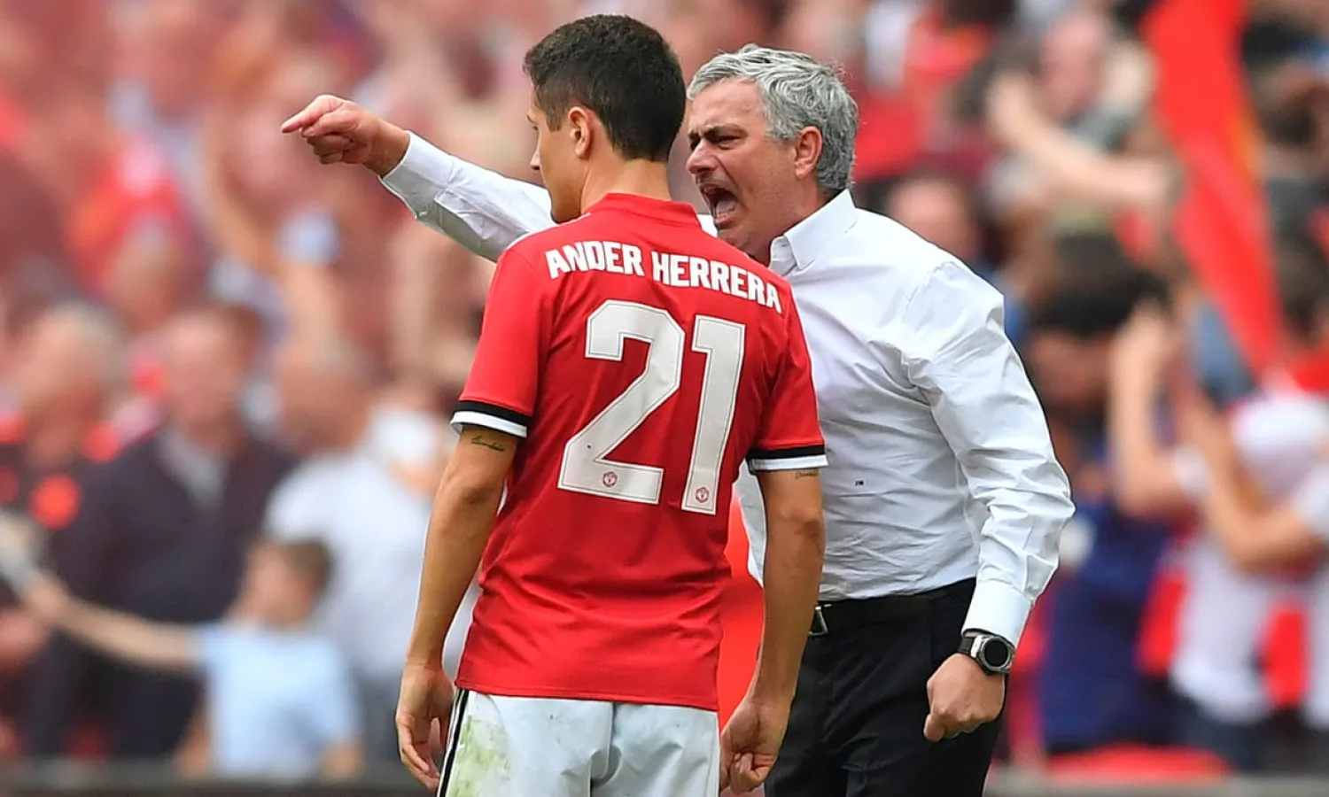 José Mourinho makes a point to midfielder Ander Herrera during the FA Cup semi-final against Tottenham in April. Photograph: Ben Stansall/AFP/Getty Images