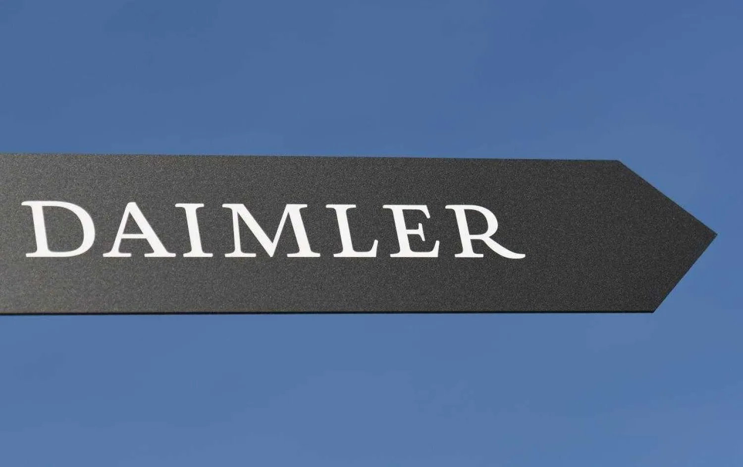 Daimler AG sign is pictured at the IAA truck show in Hanover, Germany. REUTERS/Fabian Bimmer