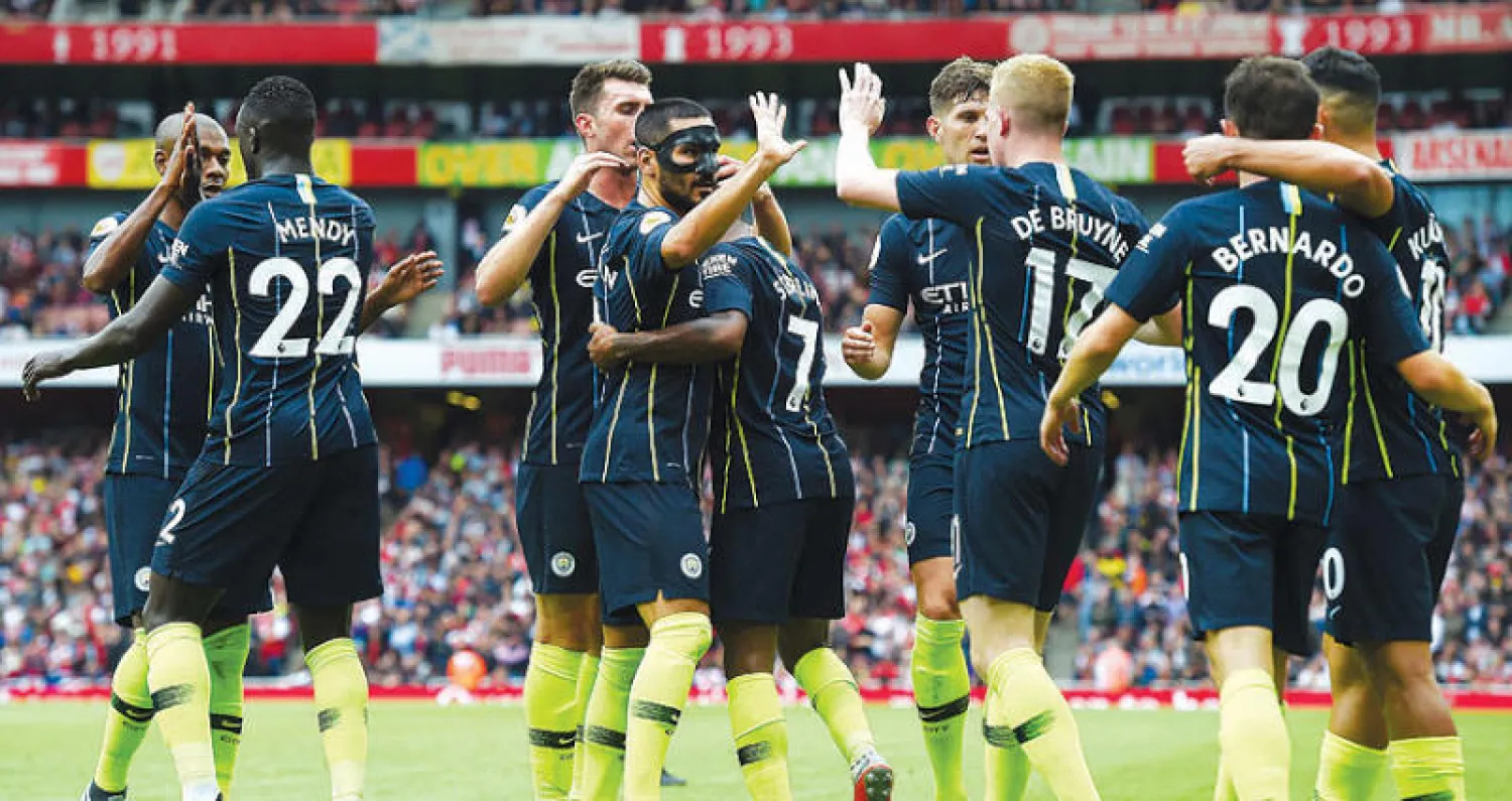 سيتي فاز في الجولة الافتتاحية على آرسنال في عقر داره وغوارديولا وصف أداء فريقه بالمثالي (إ.ب.أ)