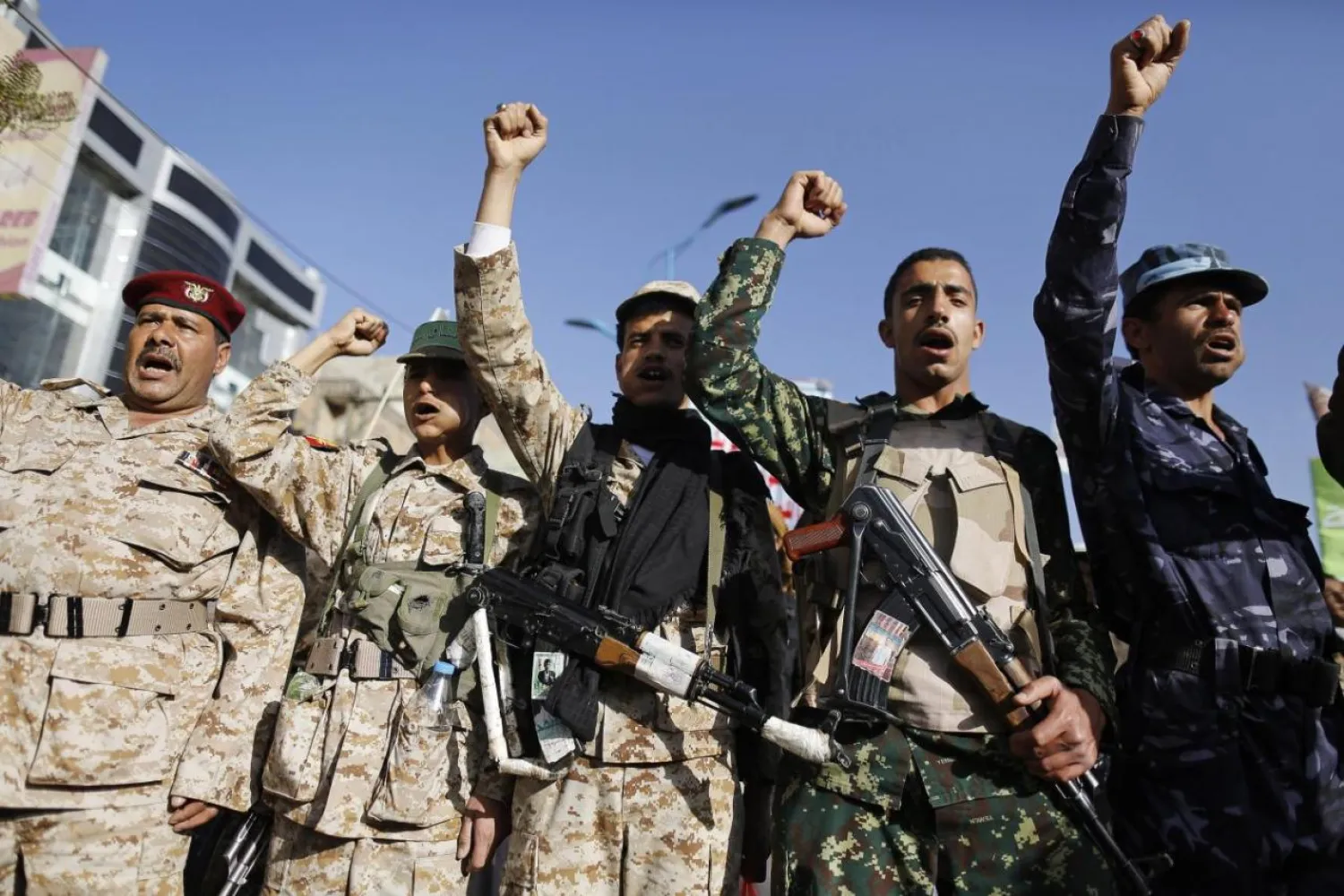 Armed Houthi militants shout slogans during a demonstration in Sanaa, Yemen. (Reuters)