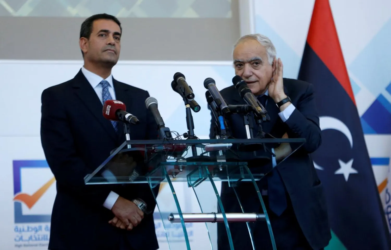 Head of the High National Elections Commission Dr. Emad Al-Sayah (L) and UN special envoy to Libya Ghassan Salameh hold a press conference in Tripoli in December. (Reuters)