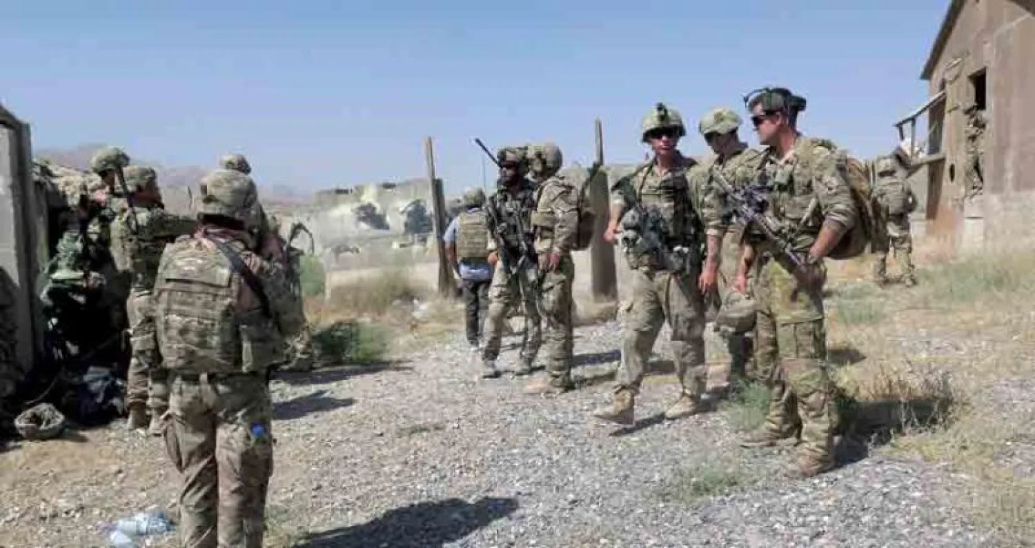 قوات أميركية وأفغانية في تدريبات مشتركة بقاعدة ميدان بولاية ورداك أمس (رويترز)