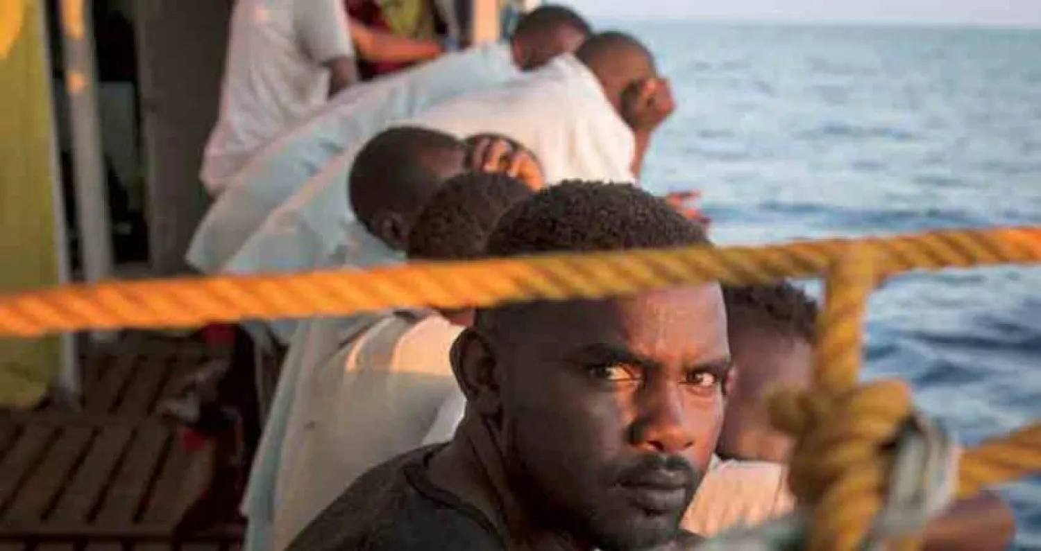 مهاجرون افارقة بعد اعادتهم من عمق البحر على متن قارب انقاذ ليبي اوائل الشهر الحالي (أ.ب)