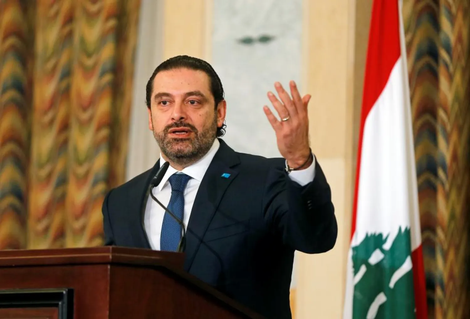 Lebanese Prime Minister Saad Hariri gestures during a donor conference in Beirut, Lebanon February 1, 2018. REUTERS/Mohamed Azakir