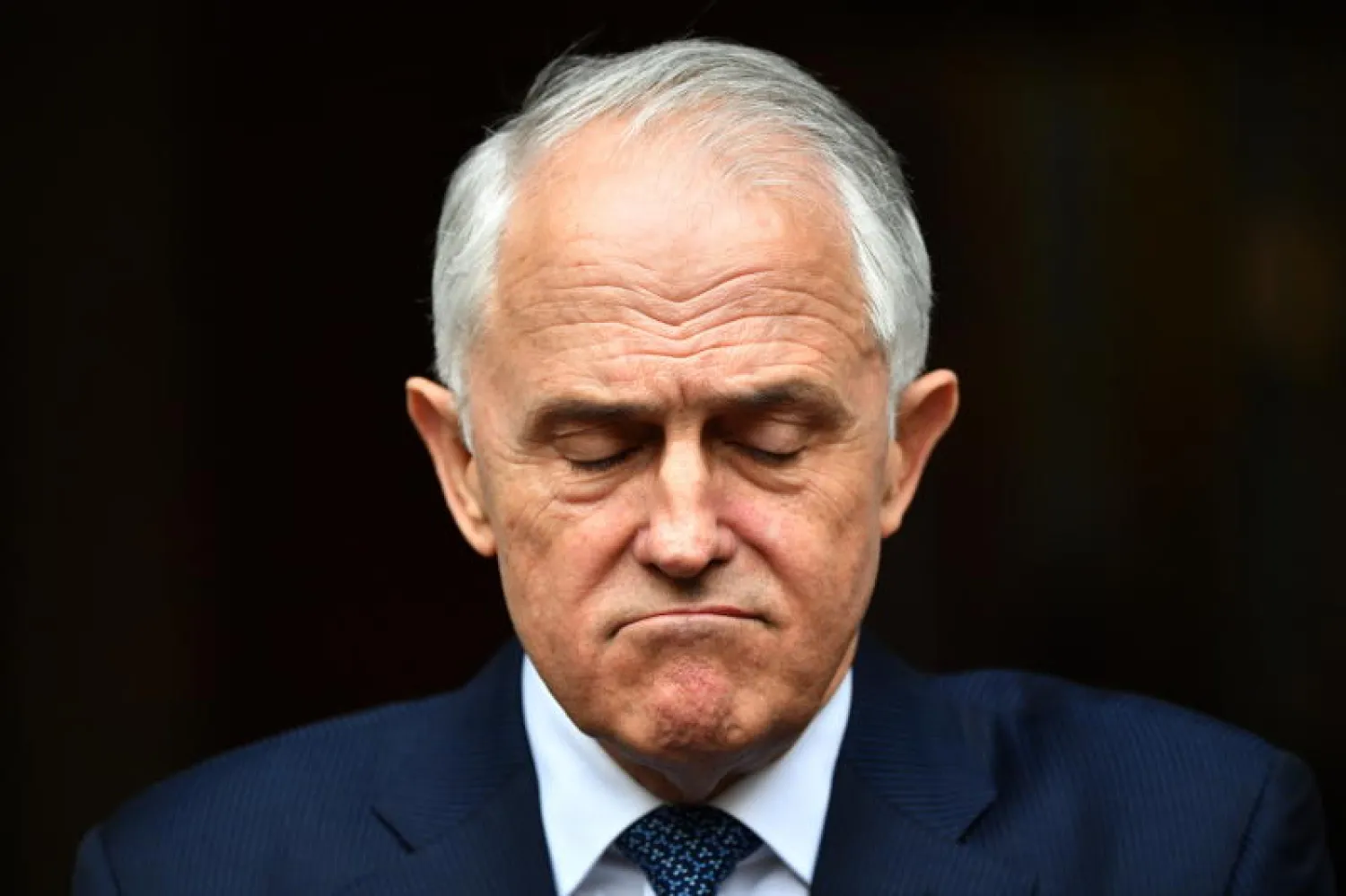 رئيس الوزراء الأسترالي مالكولم ترنبول يتحدث للصحافيين في كانبيرا (إ.ب.أ)