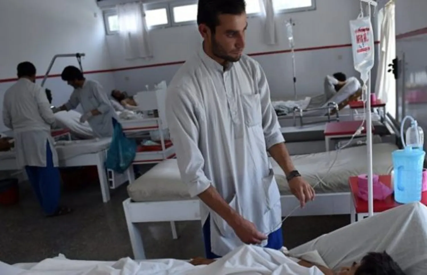 Doctor treating a patient in hospital Algeria after Cholera spread (AFP)