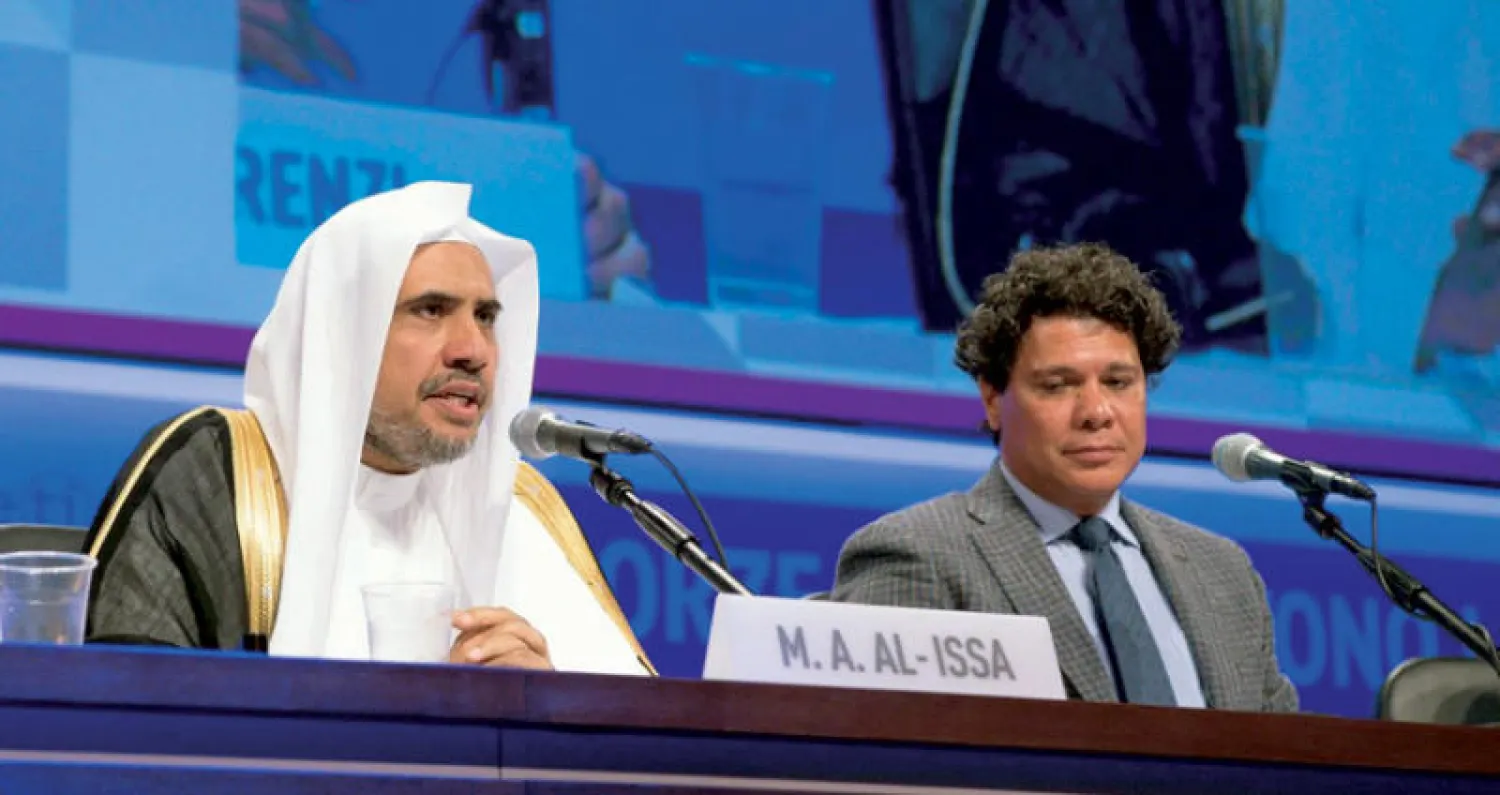 د. محمد العيسى أمين عام رابطة العالم الإسلامي متحدثاً في فعاليات الصداقة بين الشعوب («الشرق الأوسط»)