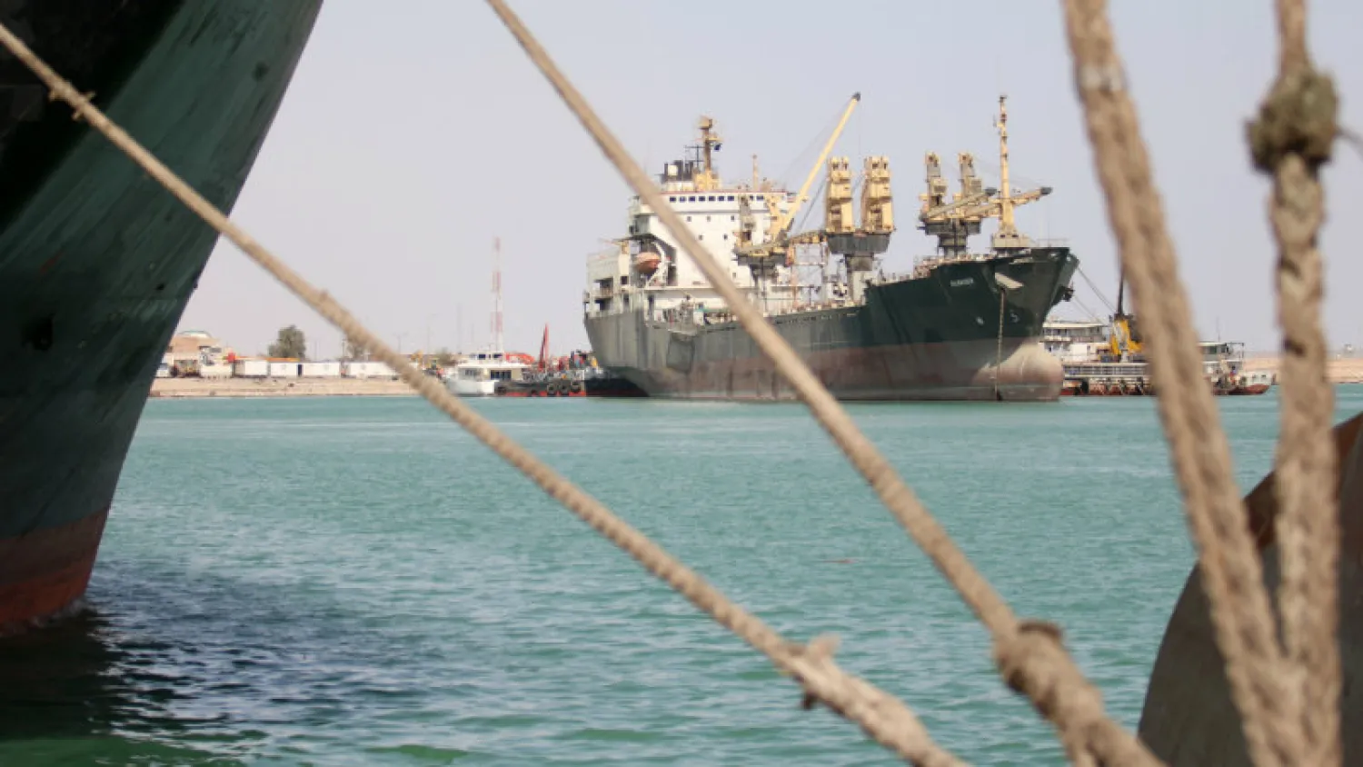 A picture taken on October 10, 2015 shows cargo ships docked at the Iraqi port of Umm Qasr near Basra. (AFP)
