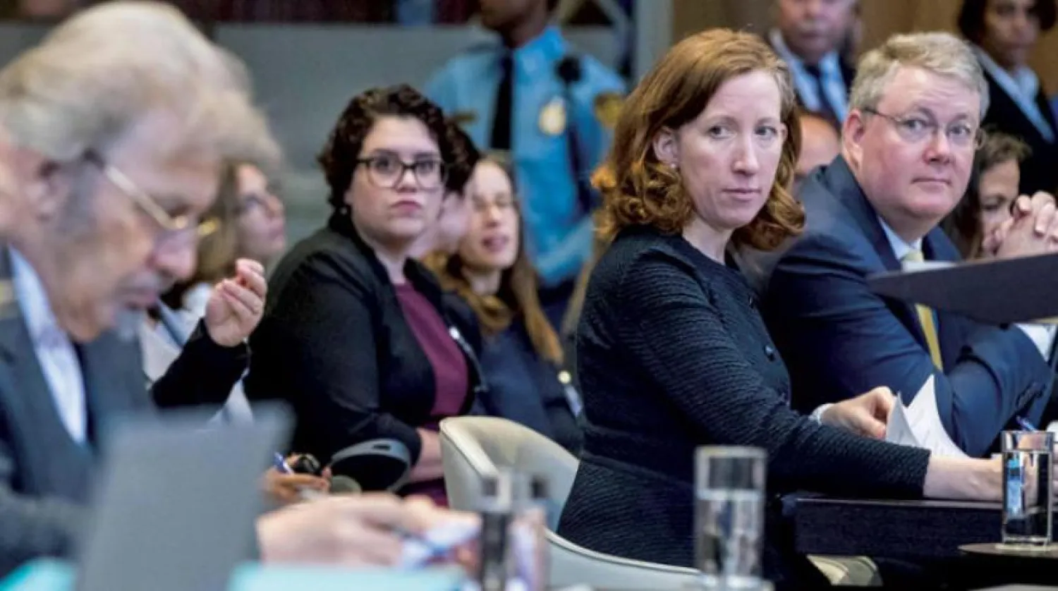 Jennifer G Newstead (C), lawyer of lawyer for the United States and representative of Iran Mohsen Mohebi (L) are pictured during the opening of case between Iran and the United States at the The International Court of Justice (ICJ) in the Hague, August 27, 2018. (AFP PHOTO / ANP / Jerry Lampen)
