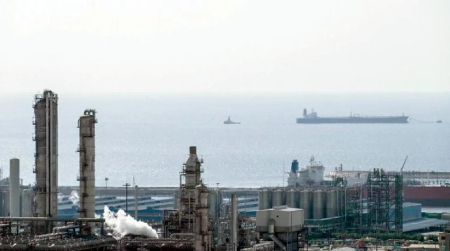  An oil tanker passes by a gas facility in Iran's southern Pars field (Reuters)