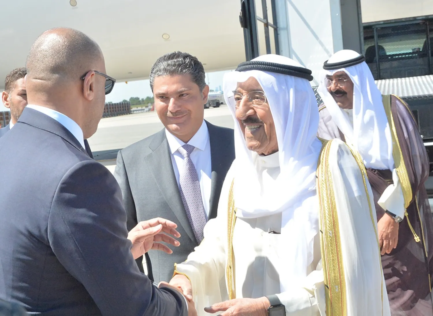 Kuwait Emir Sheikh Sabah Al Ahmad Al Sabah is received at the airport upon his arrival in the United States. (KUNA)