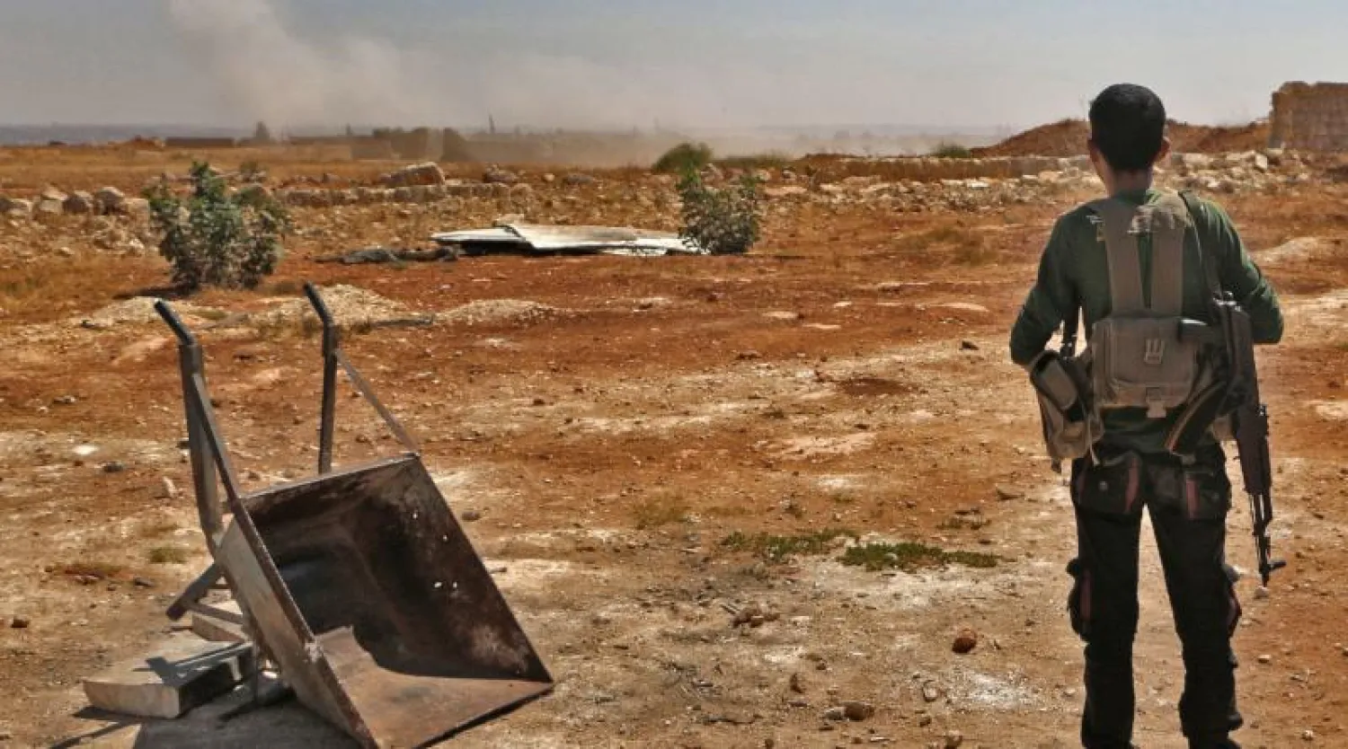 عنصر من المعارضة السورية في إدلب (أ.ف.ب)