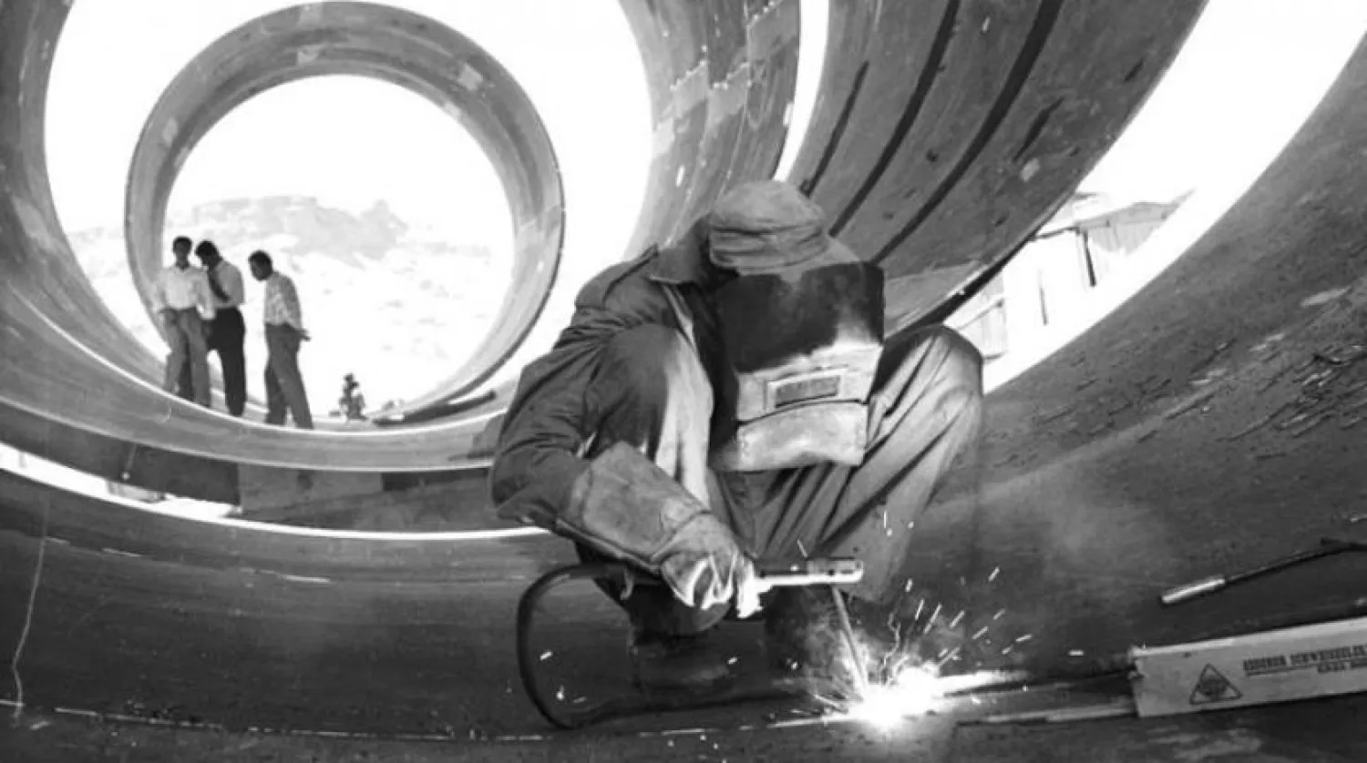 Latif Al Ani's 1961 image of an oil pipeline being built in northeast Iraq will be part of Jameel Arts Center's inaugural show. (Jameel’s Center)