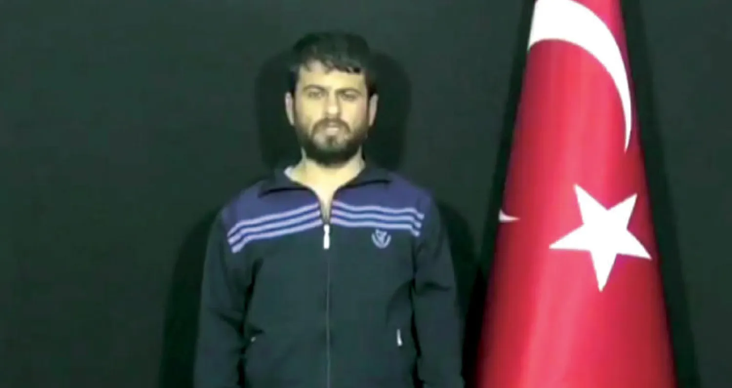 صورة وُزّعت في أنقرة ليوسف نازك العقل المدبّر المفترض لهجوم الريحانية بعد توقيفه في عملية للاستخبارات التركية في اللاذقية (أ.ف.ب)