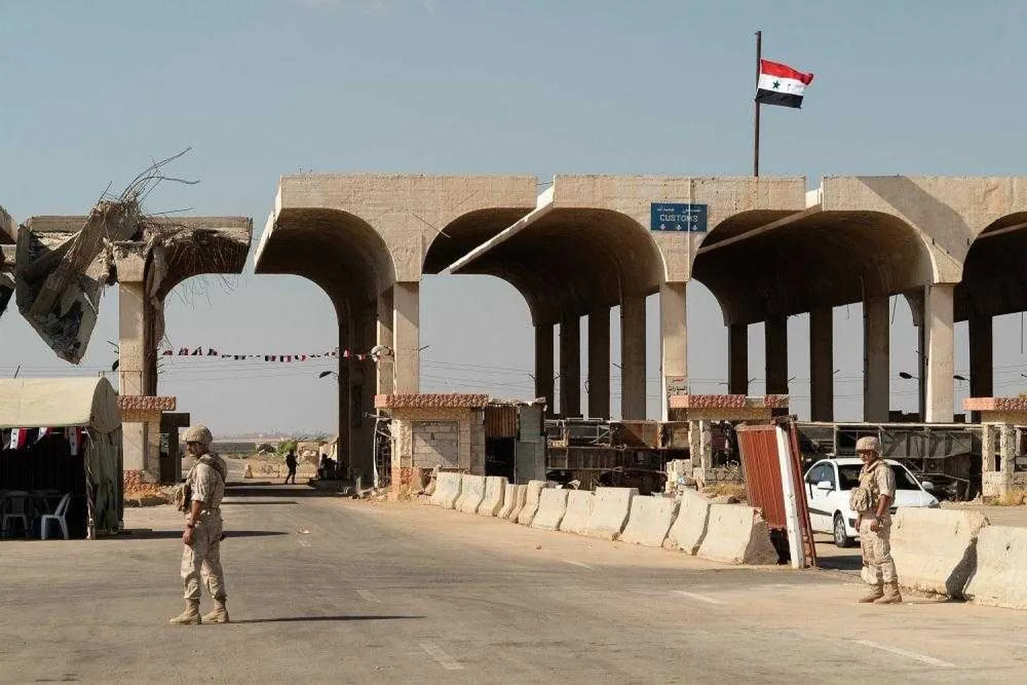 Members of the Russian military police patrol the Nassib border crossing with Jordan in the southern Syrian province of Daraa a on August 14, 2018. AFP