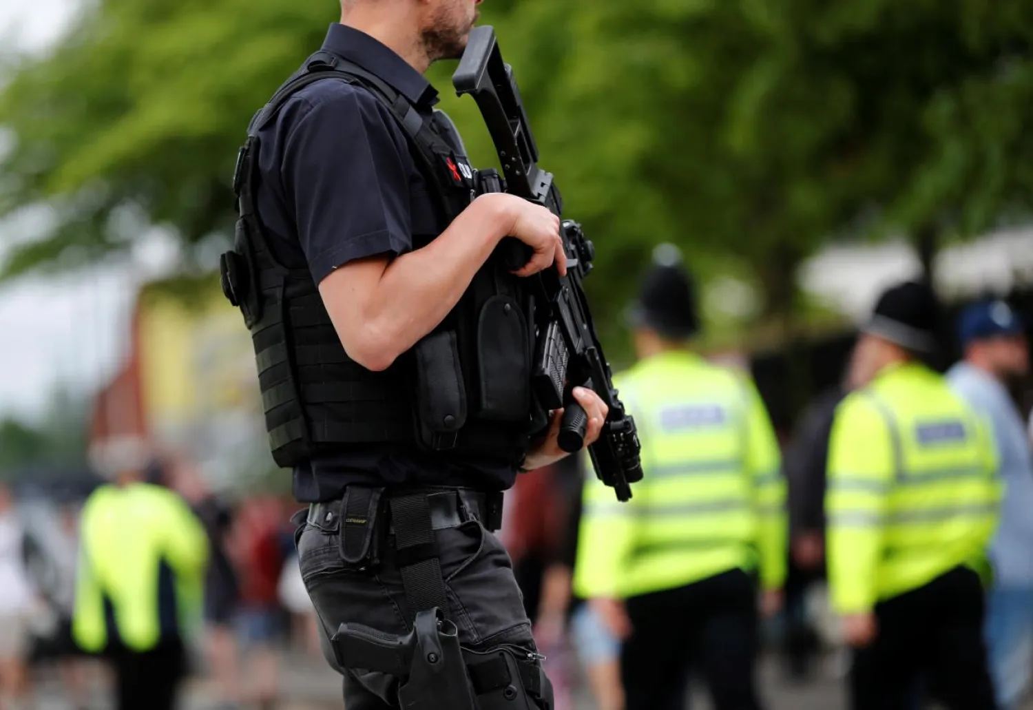 Armed policemen are seen in Manchester, Britain May 27, 2017. REUTERS/Stefan Wermuth