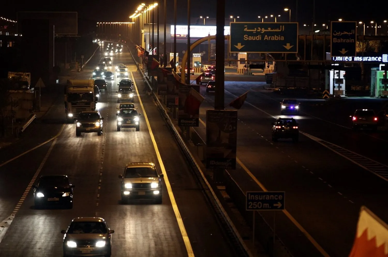 Vehicles travel into Bahrain from Saudi Arabia on the King Fahd Causeway. (AP file photo)