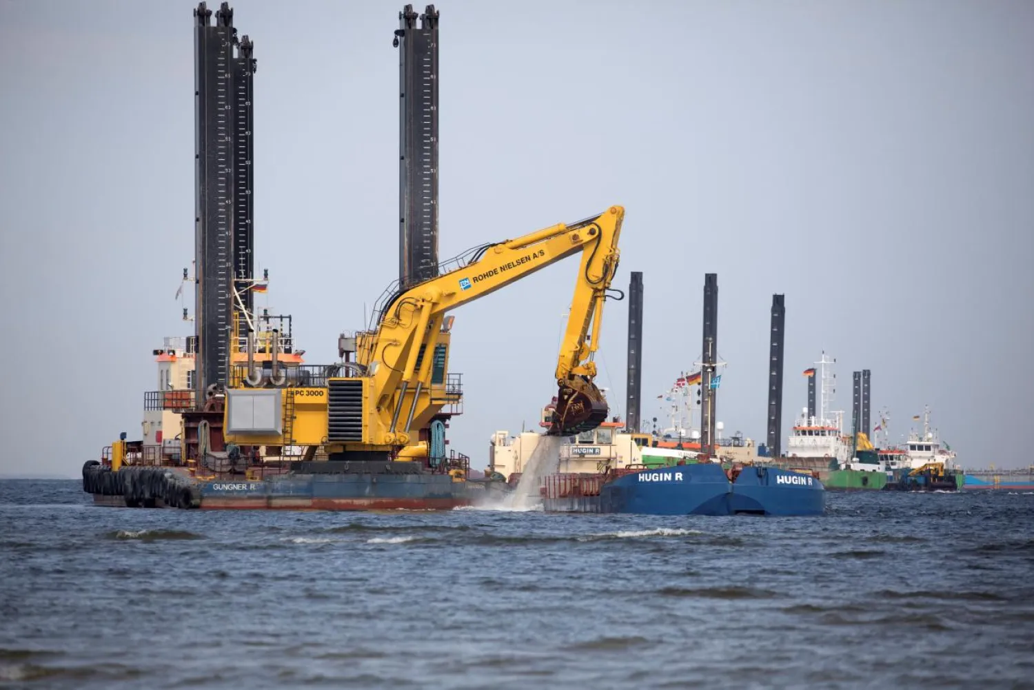 Floating excavators prepare an underwater trench for the North Stream 2 pipeline close to Lubmin, Germany, May 15, 2018. REUTERS/Axel Schmidt