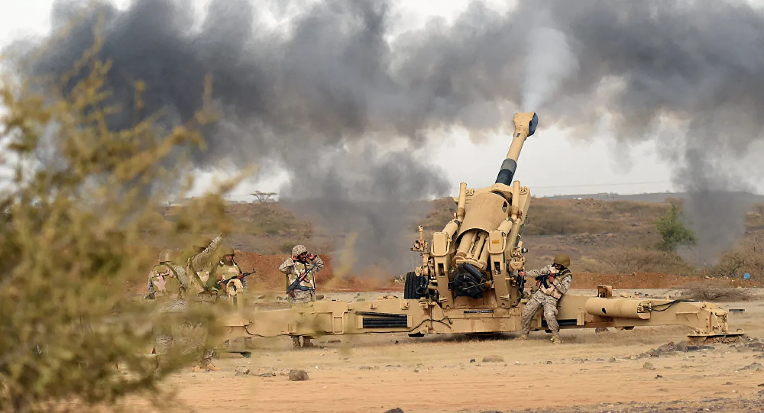 Saudi army artillery fire shells towards Yemen from a post close to the Saudi-Yemen border. (AFP)