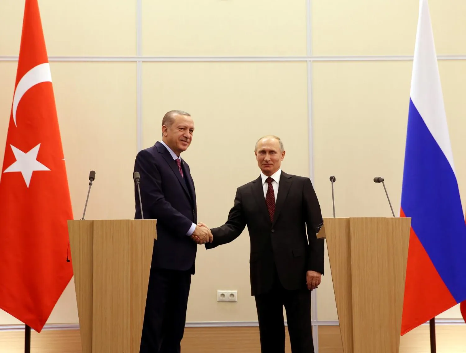 Turkish President Tayyip Erdogan and his Russian counterpart Vladimir Putin attend a news conference in Sochi, Russia, November 13, 2017, Reuters