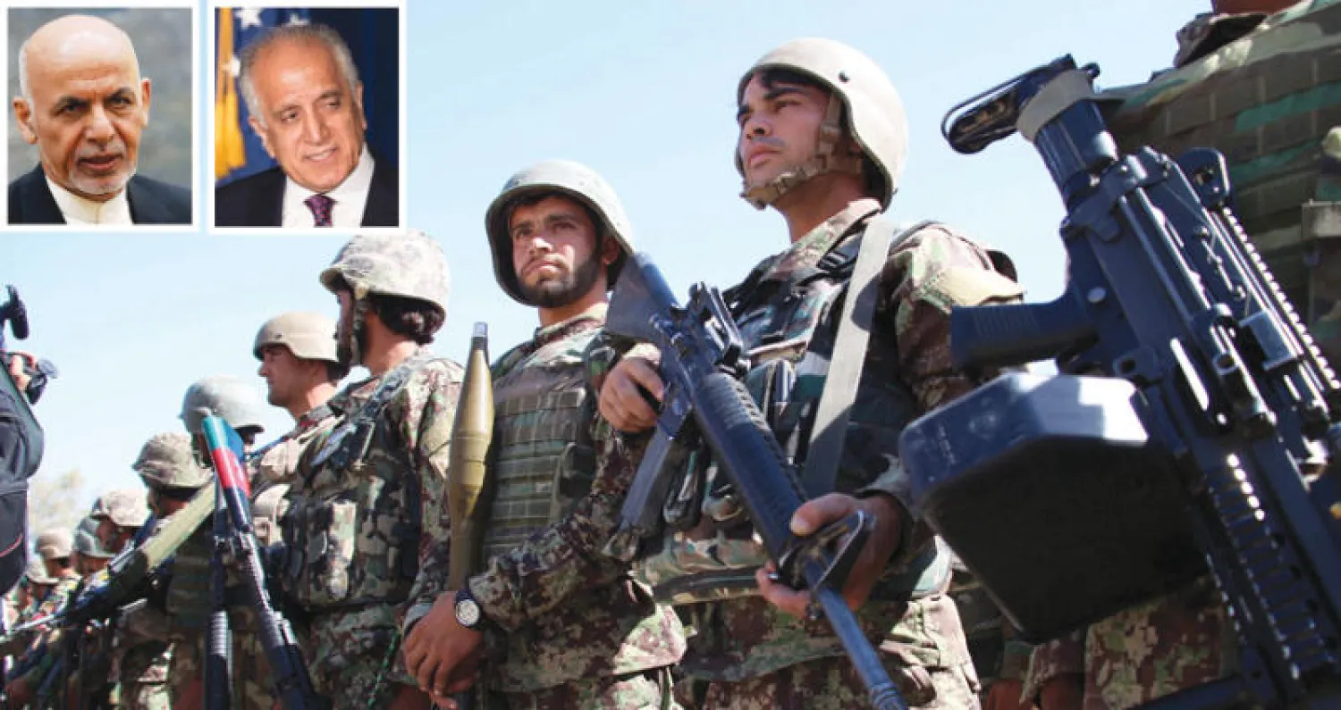 قوات أفغانية في مقاطعة ند علي بولاية هلمند بعد طرد عناصر {طالبان} منها (أ.ف.ب) - خليلزاد (واشنطن بوست) - أشرف غني (رويترز)