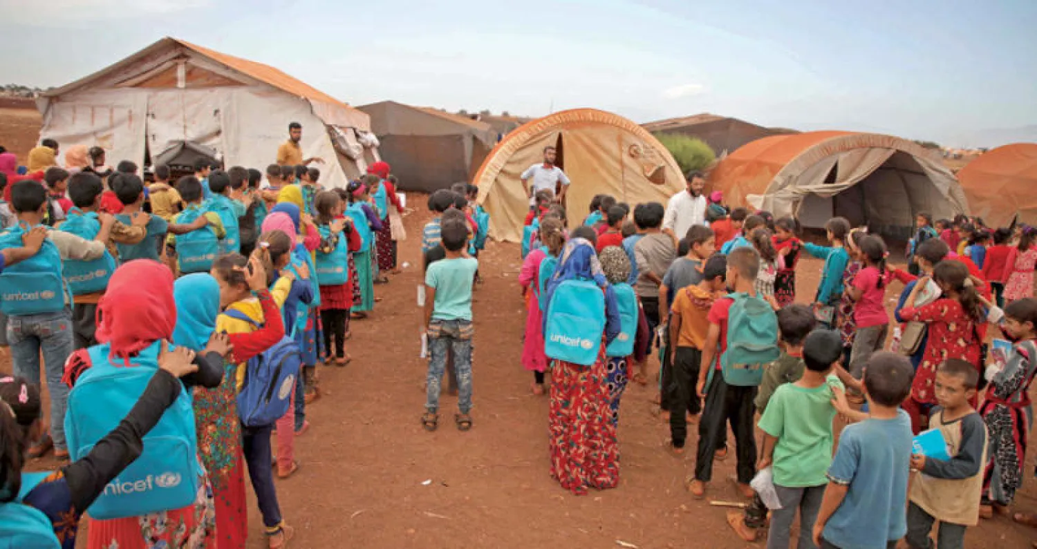 مخيم للنازحين السوريين شمال حماة (أ.ف.ب)