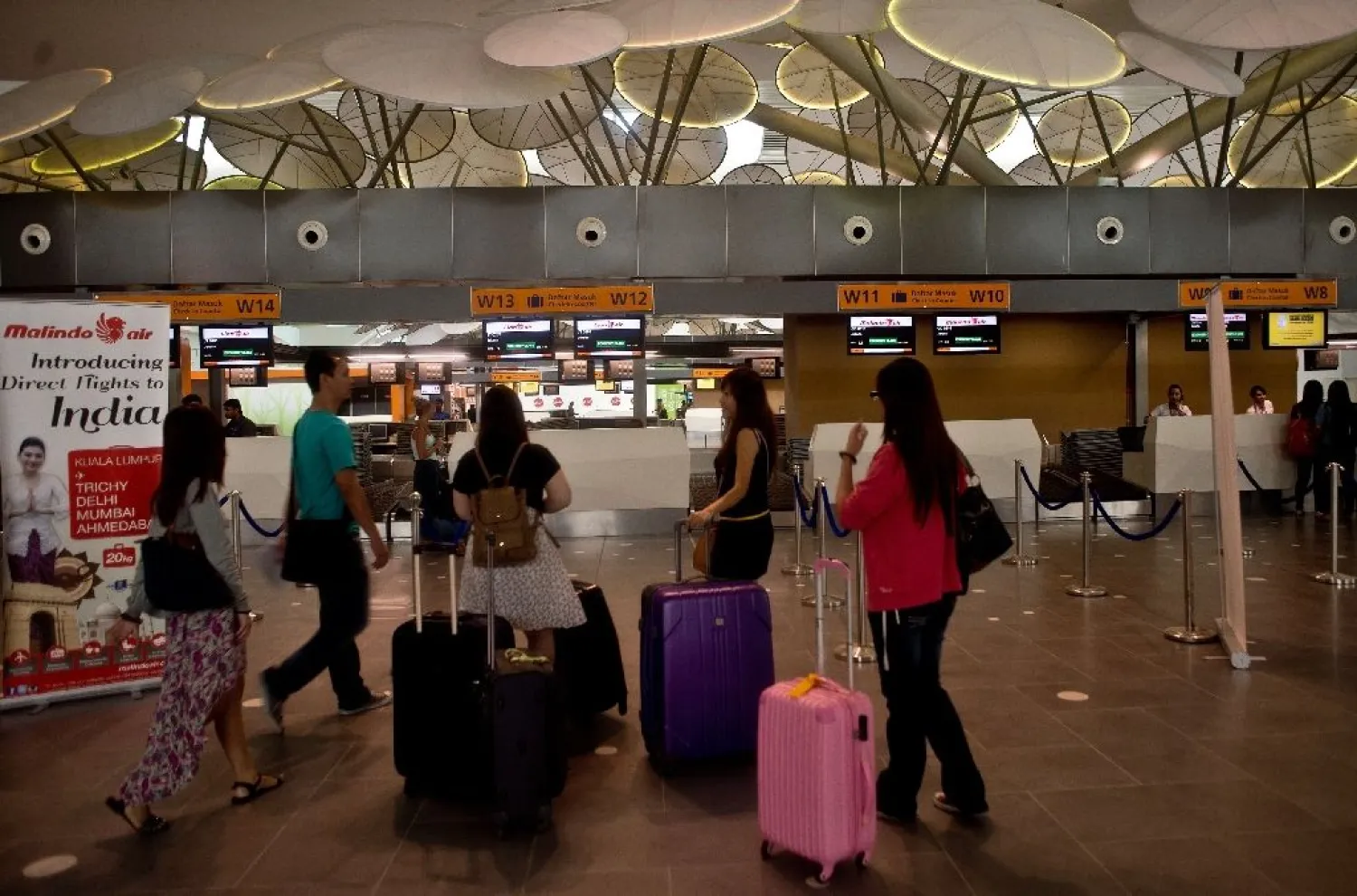 Syrian Hassan al-Kontar had been stuck at the budget terminal of Kuala Lumpur International Airport since March 7 | AFP