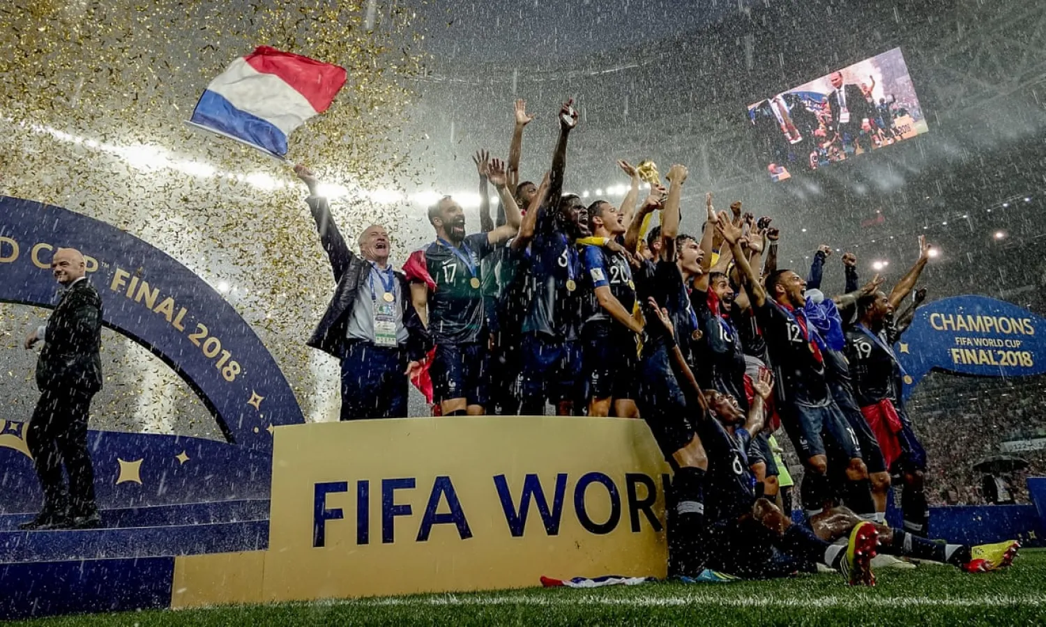  Deschamps waves the tricolor as France celebrate beating Croatia 4-2 in the World Cup final in Moscow. Photograph: David Ramos/FIFA via Getty Images