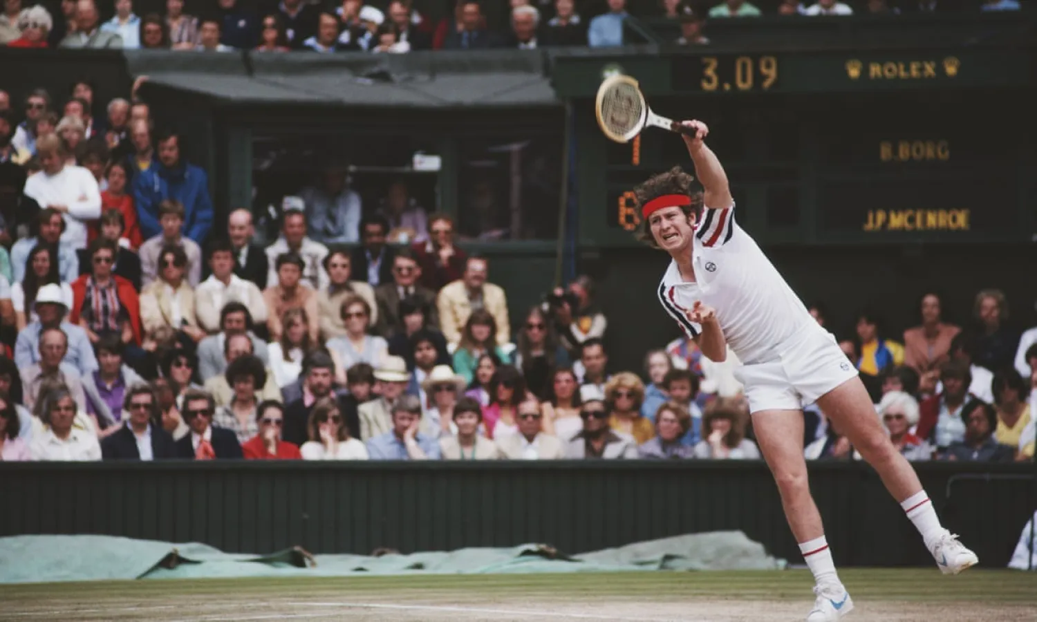 John McEnroe serves during the classic men’s singles final against Bjorn Borg at Wimbledon in 1980. Photograph: Steve Powell/Getty Images