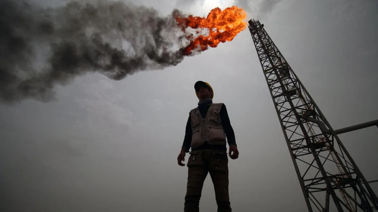 An employee stands at the Zubair oil and gasfield, north of the southern Iraqi province of Basra. (AFP)