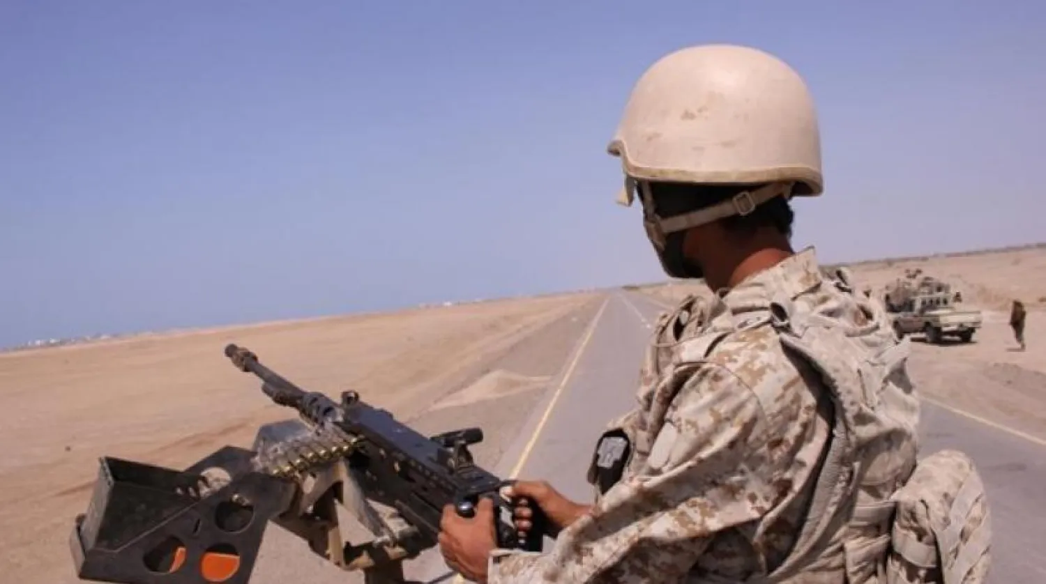 A Yemeni soldier mans a machine gun mounted on a military truck near the Red Sea coast city of al-Mokha. (Reuters)