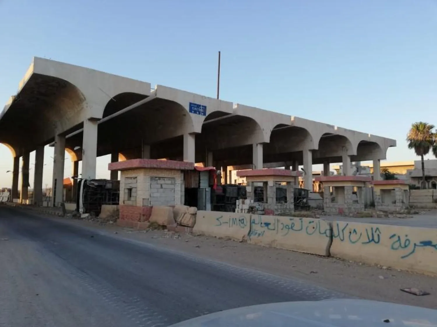 FILE PHOTO - Syrian forces of Bashar al Assad are seen in the Nassib border crossing with Jordan in Deraa, Syria July 6, 2018. Reuters