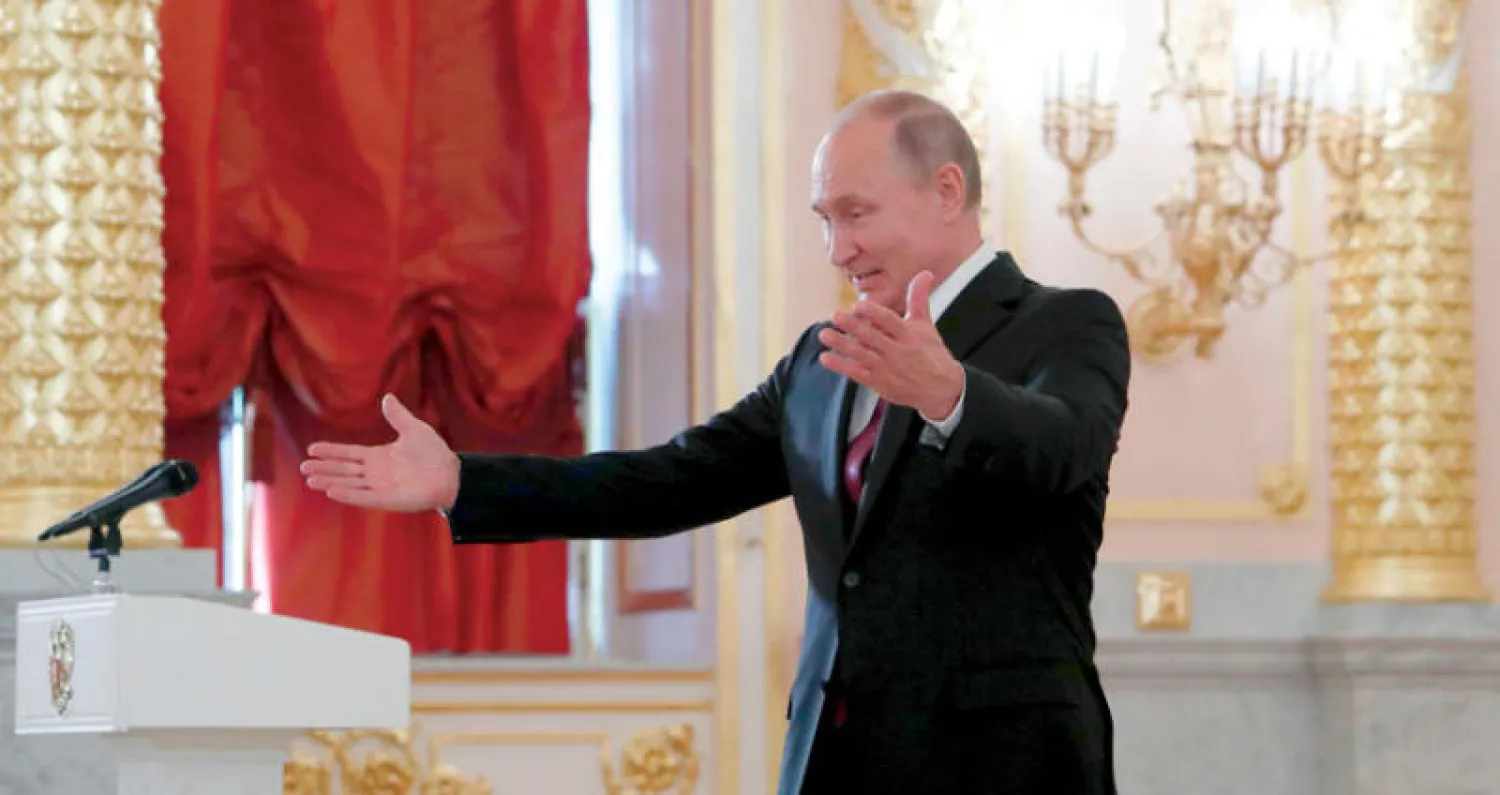 الرئيس الروسي فلاديمير بوتين يتحدث أمس في استقبال سفراء اعتمدوا حديثا في موسكو (أ.ف.ب)