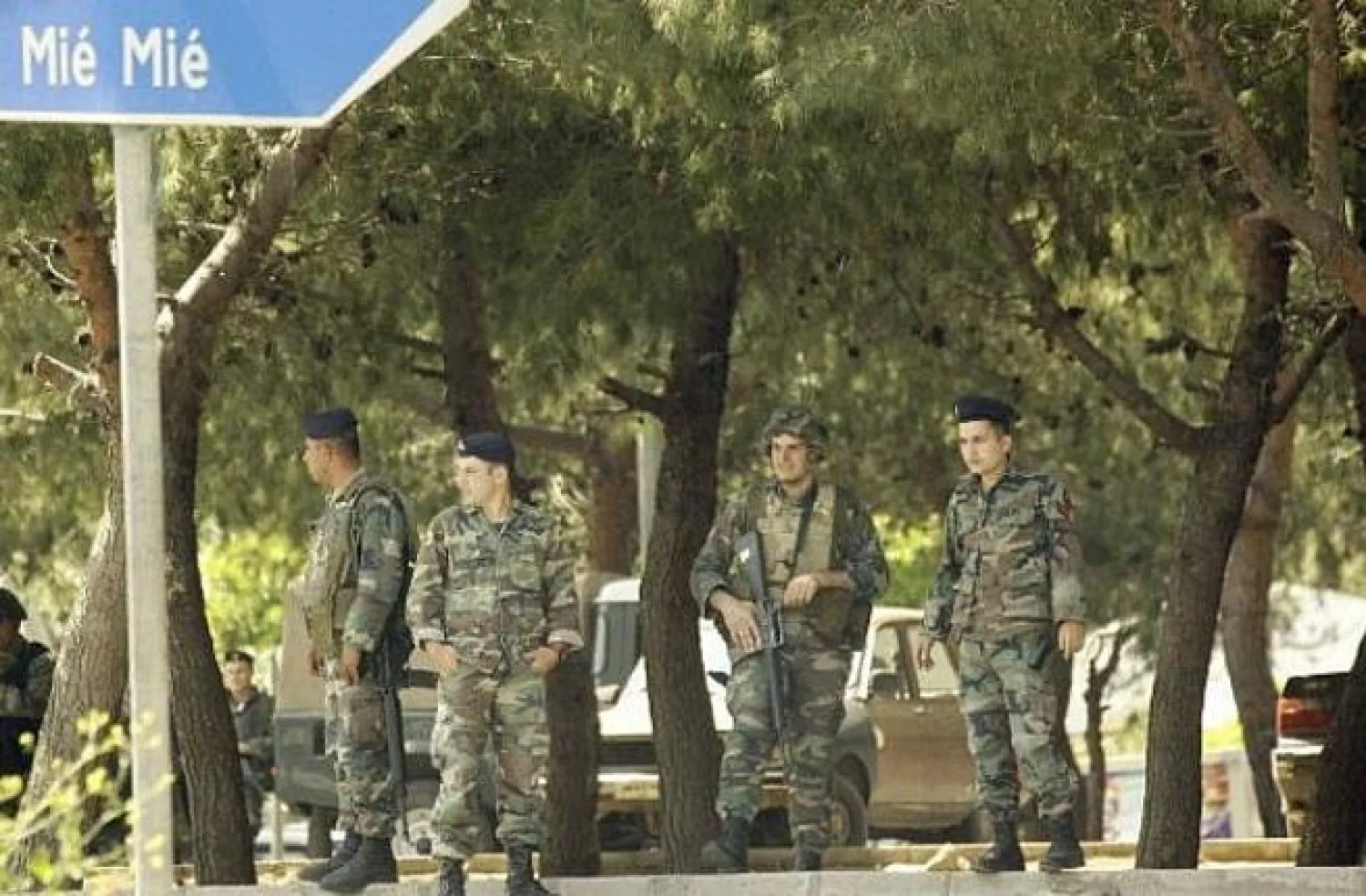 Soldiers stand guard on the road leading to Mieh Mieh Palestinian refugee camp following clashes occurred between two different Palestinian factions. (AFP/File)