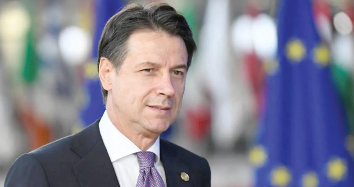 رئيس الوزراء الإيطالي جوزيبي كونتي لدى وصوله للمشاركة في قمة أوروبية في بروكسل امس (رويترز)