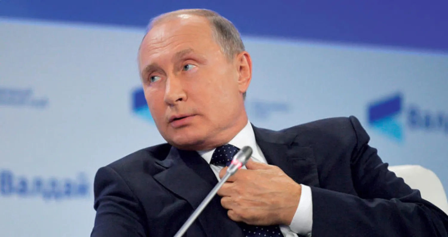 بوتين متحدثاً في مؤتمر «فاليداي» أمس (أ.ب)