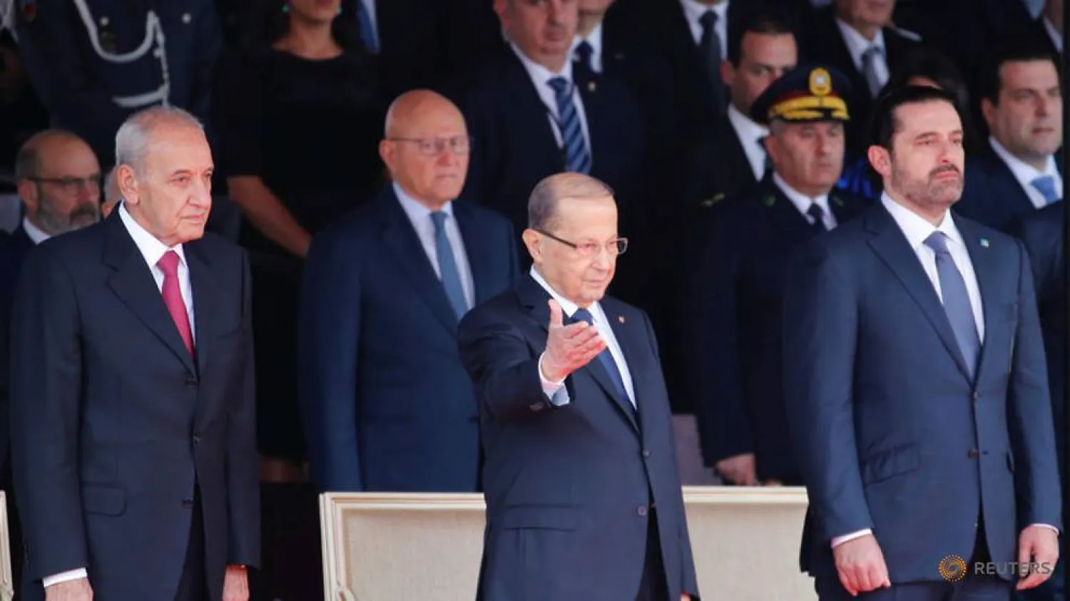 Lebanese President Michel Aoun gestures as he attends a military parade to celebrate the 74th anniversary of Lebanon's independence in downtown Beirut, Lebanon November 22, 2017. REUTERS/Mohamed Azakir